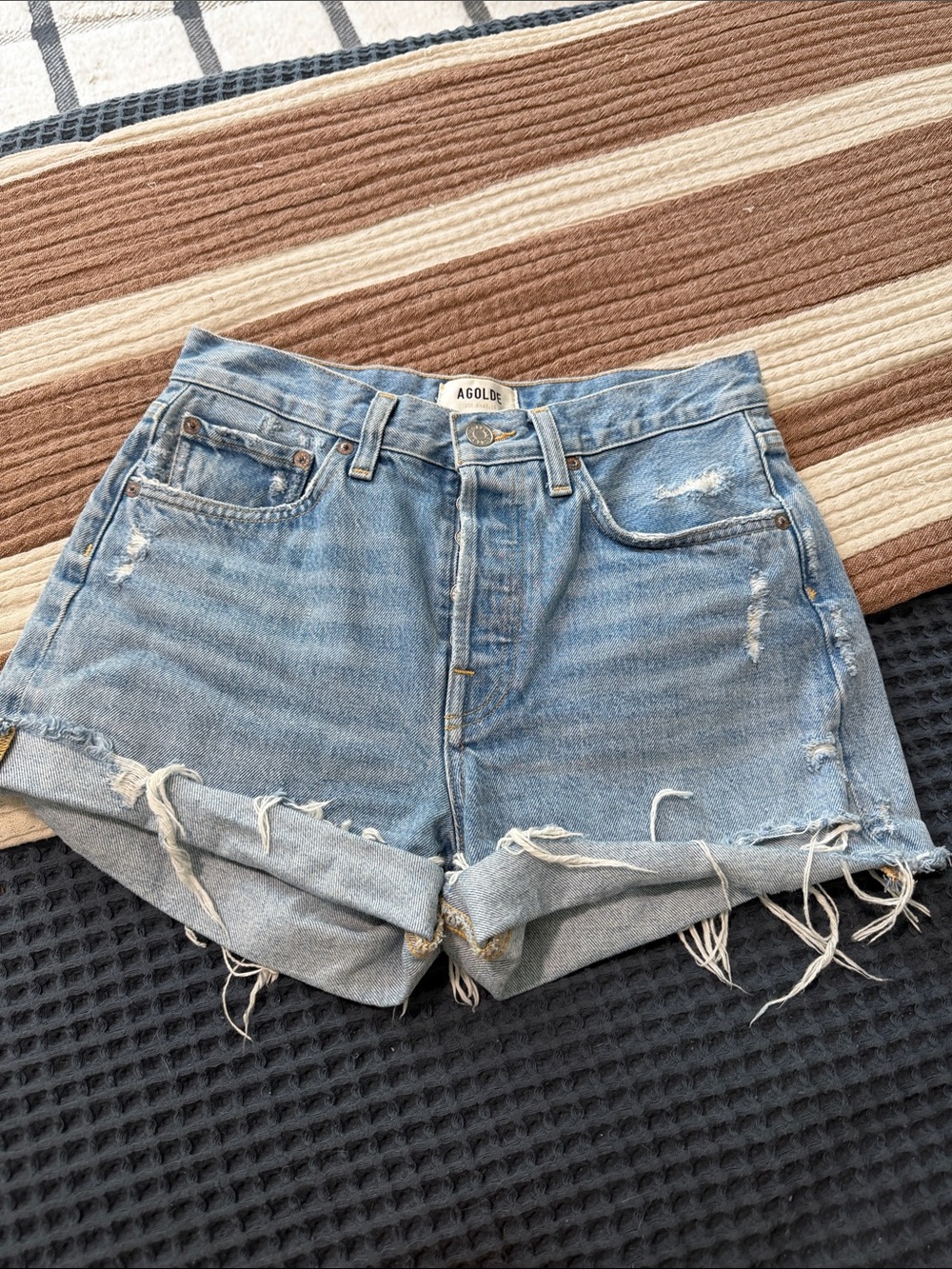 Agolde Light Wash Distressed Rolled Hem Denim Shorts